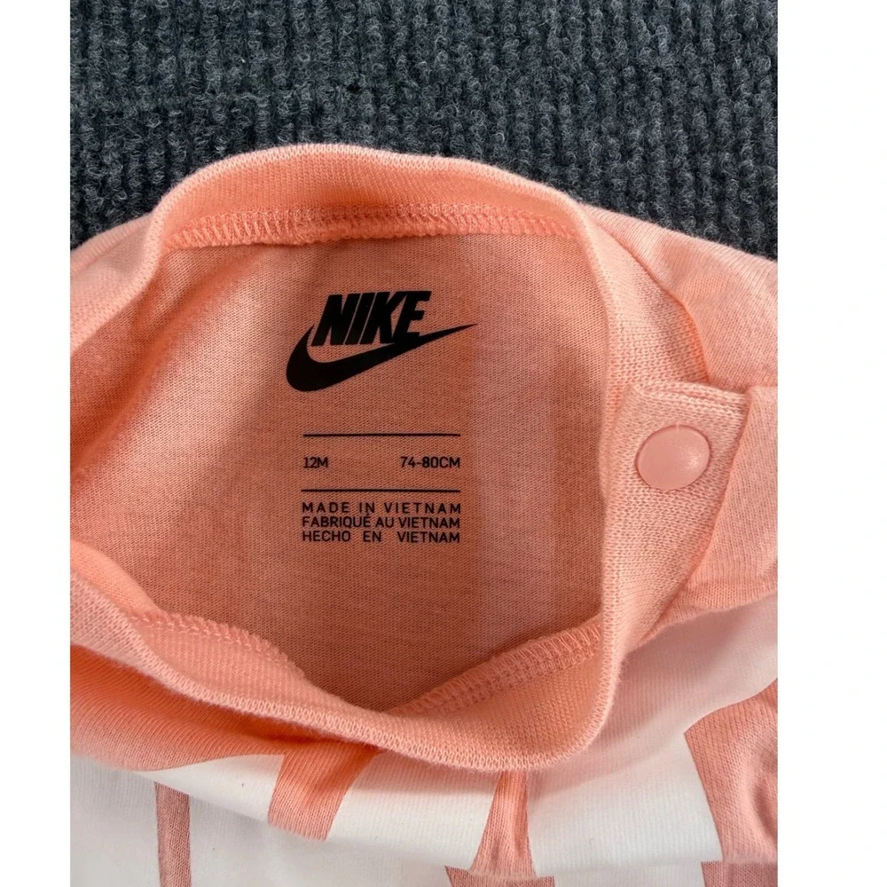 Nike Infant Futura Logo Romper Bleached Coral Pink 12M 56G385-A68 NWT